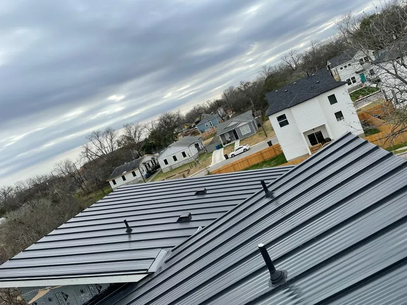 Standing seam metal roof panels with vents for Skylight Repair in Rockport